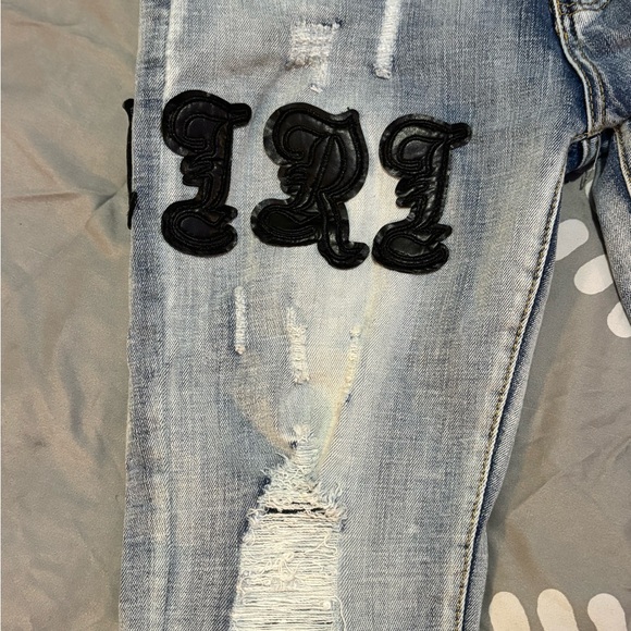 AMIRI Light Blue Distressed Skinny Jeans - Picture 2 of 9